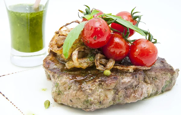 Grilling steak with tomato sauce — Stock Photo, Image