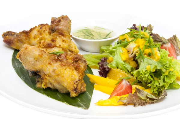 Chicken in curry with salad and sauce — Stock Photo, Image