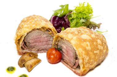 Beef in pastry with salad