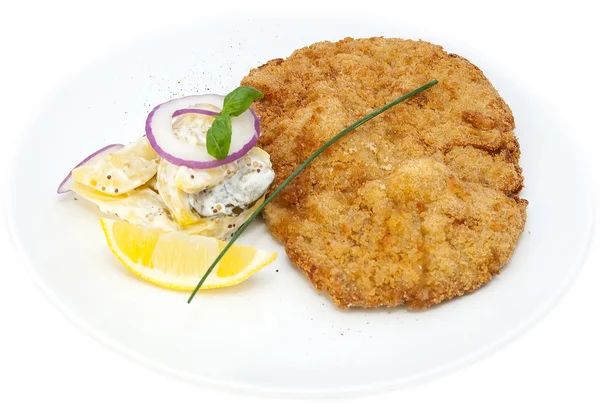 Schnitzel en fruit salade — Stockfoto