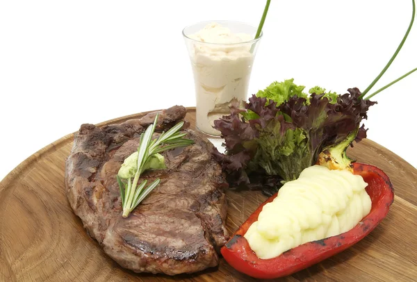 Steak and fresh herbs — Stock Photo, Image