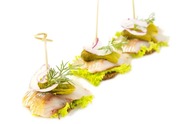 Canape with meat vegetables and seafood — Stock Photo, Image