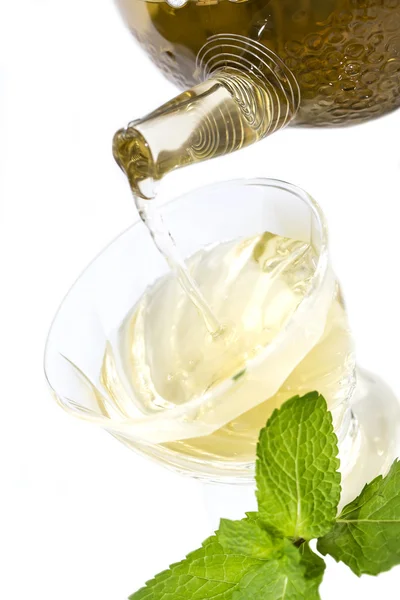 Tea poured from a teapot — Stock Photo, Image