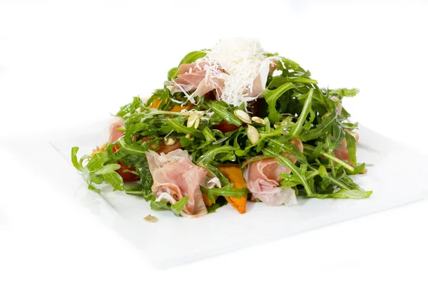 Salad of arugula ham cheese — Stock Photo, Image