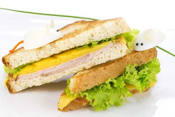 Sandwich with ham and cheese, decorated eggs — Stock Photo, Image