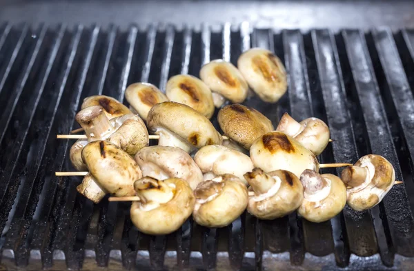 Mushrooms grilling — Stock Photo, Image