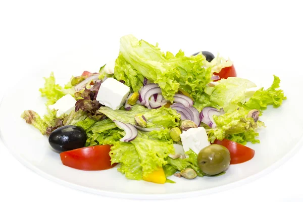 Salada com tomate de queijo e verdes — Fotografia de Stock