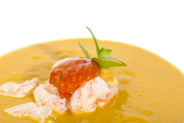 Pumpkin soup with shrimp and tomato — Stock Photo, Image