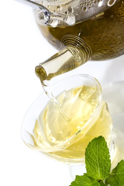 Tea poured from a teapot — Stock Photo, Image