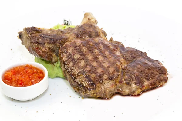 Grilling steak with tomato sauce beef beefsteak — Stock Photo, Image