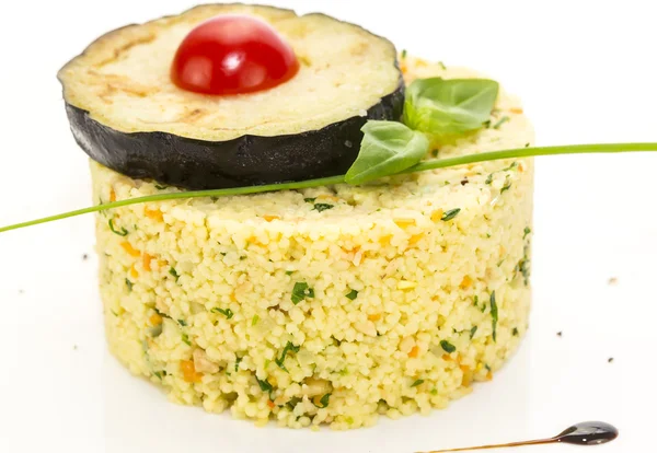 Couscous embellished with eggplant and tomato — Stock Photo, Image