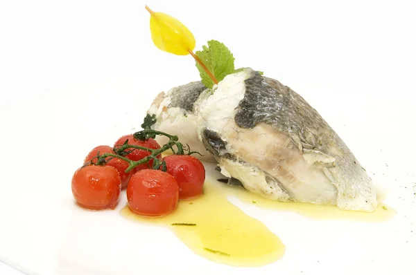 Baked fish with cherry tomatoes — Stock Photo, Image