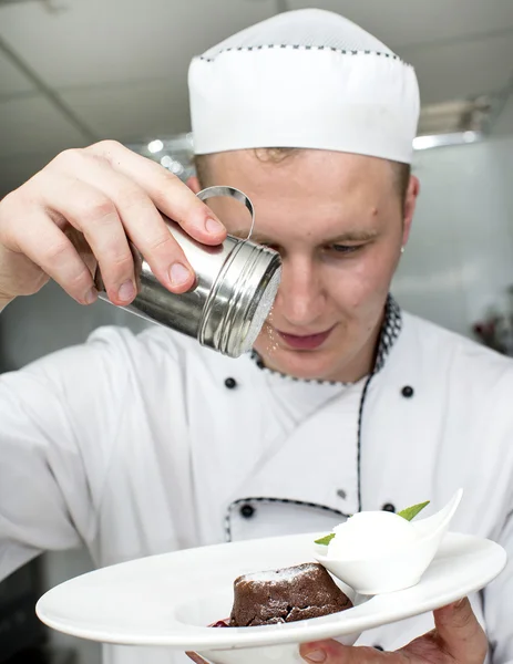 Chef preparing food in the kitchen — Stock Photo, Image