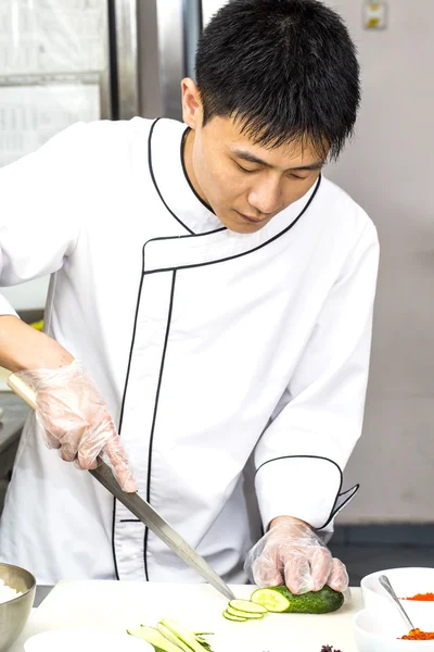 Japanese chef with a plate of sushi — Stock Photo, Image