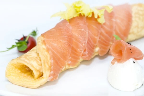 Eggs with cheese and salmon decorated with tomato — Stock Photo, Image