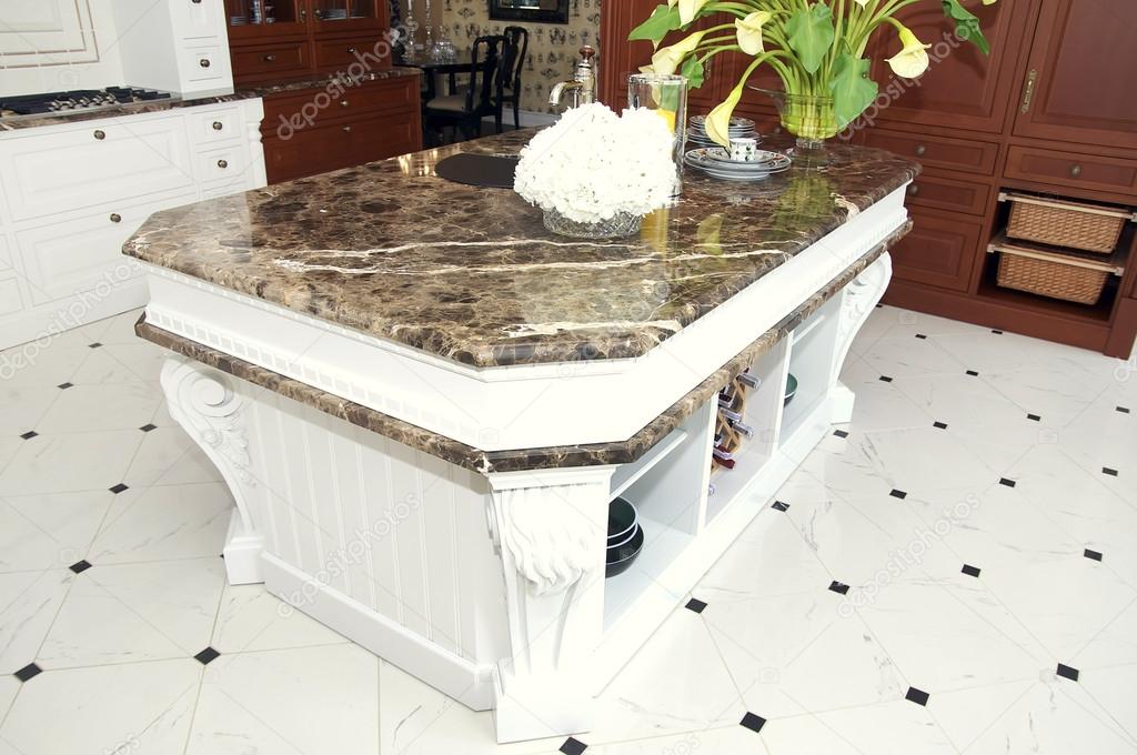 Stylish kitchen with marble table