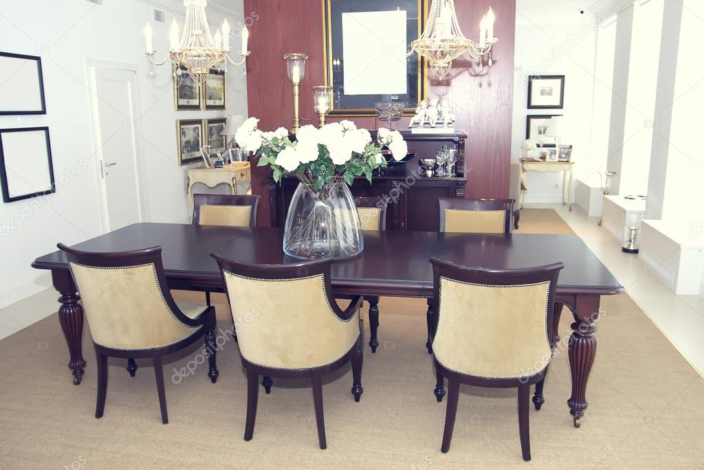 Dining room with large table and comfortable chairs Stock Photo by ©Lester120 40559795