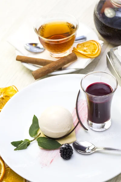 Cream dessert garnished with mint — Stock Photo, Image