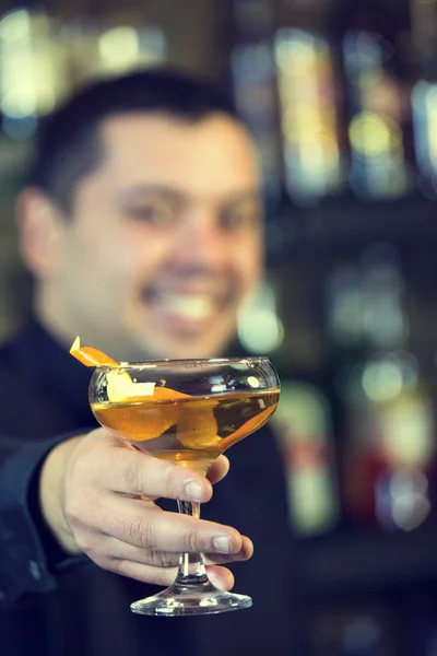 Bartender in a nightclub bar — Stock Photo, Image