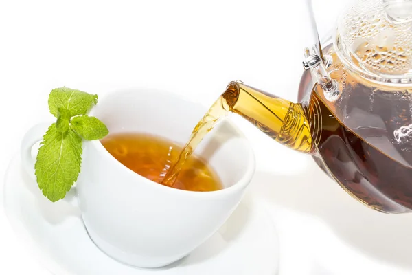 Tea poured from a teapot — Stock Photo, Image