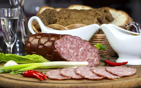 Sausage on a wooden — Stock Photo, Image