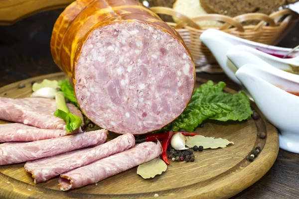 Sausage on a wooden — Stock Photo, Image