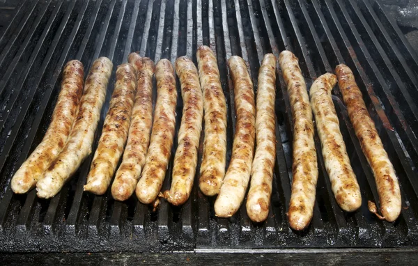 Cooking sausages — Stock Photo, Image