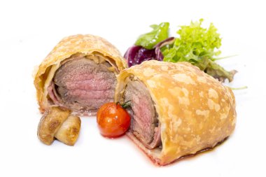 Beef in pastry with salad