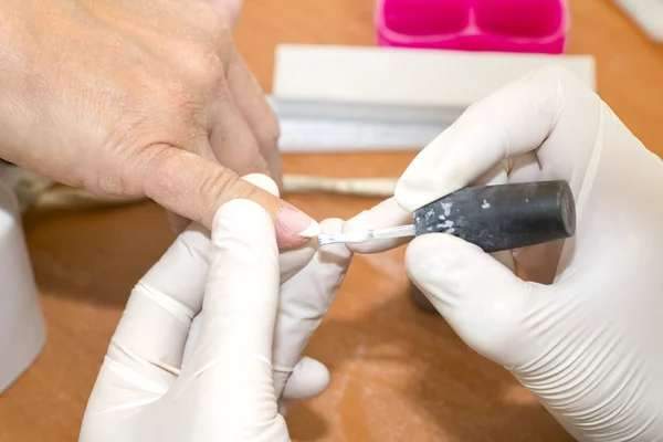 Woman doing manicure — Stock Photo, Image