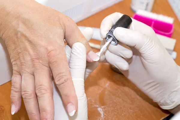 Woman doing manicure — Stock Photo, Image