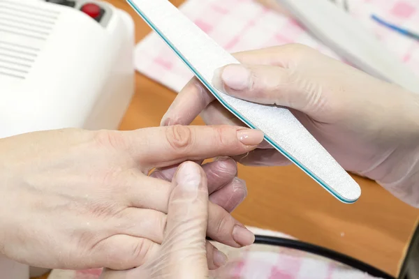 Woman doing manicure — Stock Photo, Image