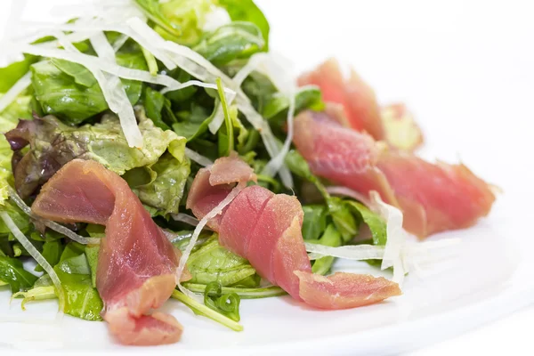 Salad of arugula ham cheese — Stock Photo, Image