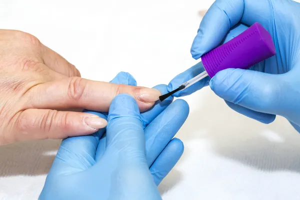 Woman doing manicure — Stock Photo, Image