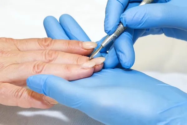 Woman doing manicure — Stock Photo, Image