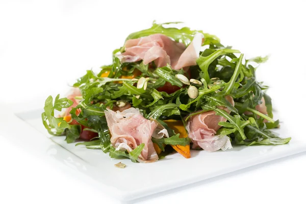 Salad of arugula ham cheese — Stock Photo, Image