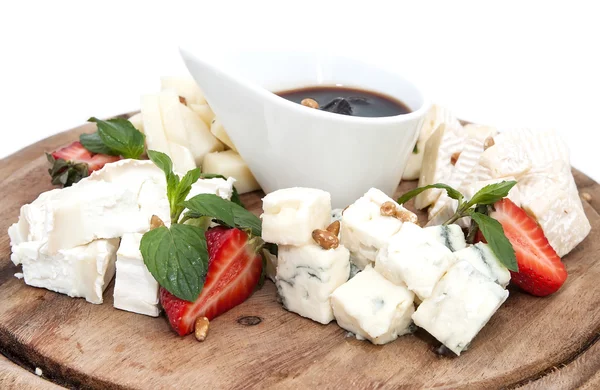 Cheese plate with several varieties of cheese — Stock Photo, Image