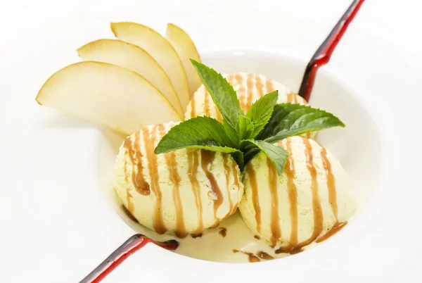 Balls of ice cream decorated with mint — Stock Photo, Image