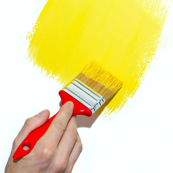 Painting a wall yellow — Stock Photo, Image
