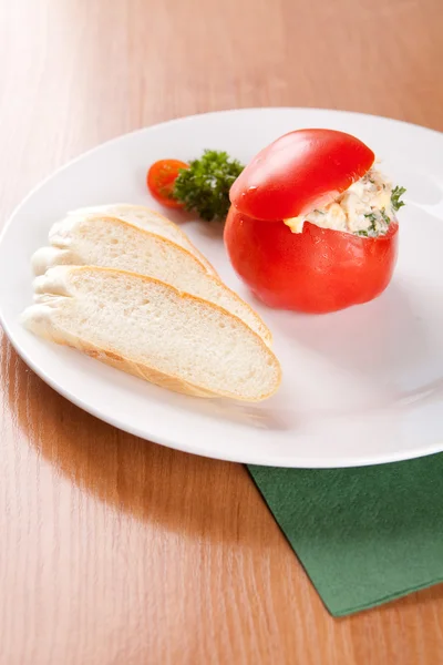 Tomatoes stuffed with spread of eggs and tuna — Stock Photo, Image