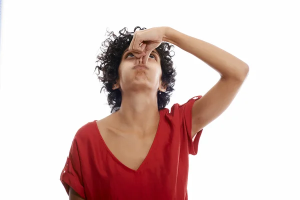 Hispanic young woman holding breath — Stock Photo, Image