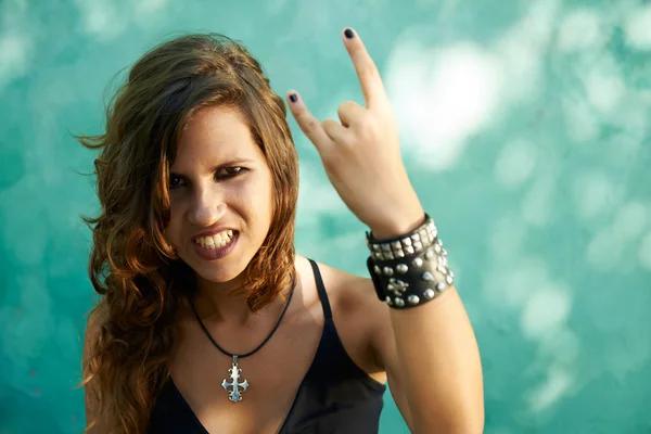 Portrait of young woman in heavy metal style — Stock Photo, Image