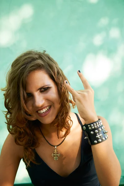 Portrait of young woman in heavy metal style — Stock Photo, Image