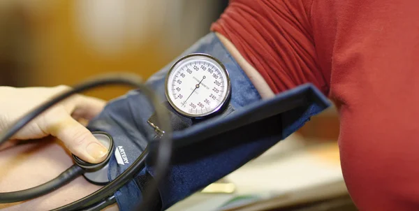Blood pressure testing Stock Photo