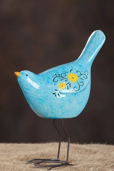 Figurine Blue Bird Yellow Flowers Wing — Stock Photo, Image