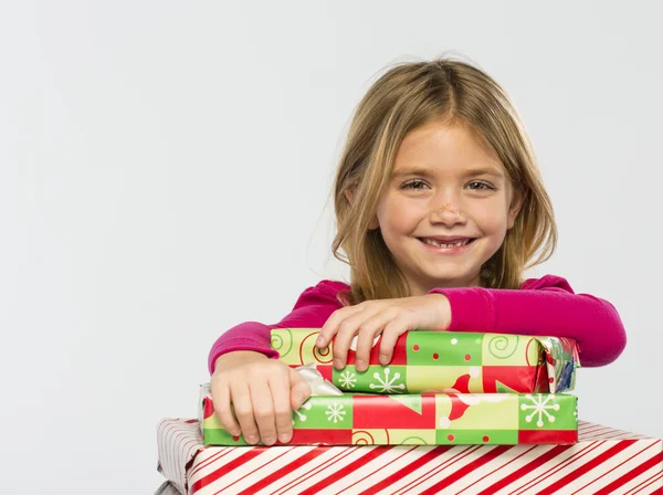 Niña con regalos — Foto de Stock