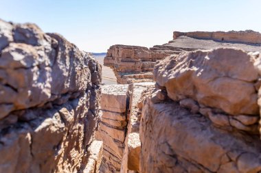 Gara Medouar, also known as Jebel Mudawwar, Gara Mdouar or Mdoura is a horseshoe-shaped geological formation near Sijilmasa, Morocco.  clipart