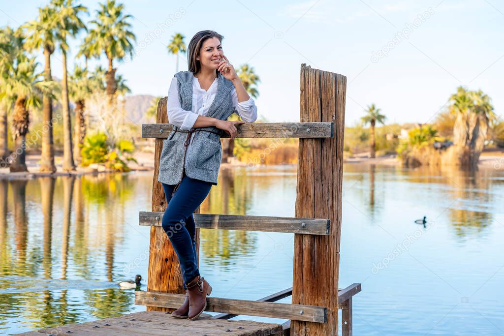 A beautiful hispanic model enjoys the Arizona desert on a winters day
