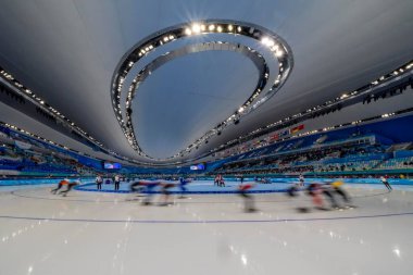 Ulusal Hız Pateni Oval, Pekin, Hebei, Çin 'de düzenlenen 2022 Pekin Kış Olimpiyatları sırasında Mens Speed Skating Mass Start etkinliğine ev sahipliği yapıyor..