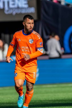 Arjantinli FC Cincinnati Orta saha oyuncusu LUCIANO ACOSTA, Charlotte, Kuzey Carolina 'daki Bank of America Stadyumu' nda The Charlotte FC 'ye karşı oynuyor. Charlotte FC düzenlemelerde konuk FC Cincinnati 'yi 2-0 yendi..