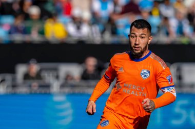 Arjantinli FC Cincinnati Orta saha oyuncusu LUCIANO ACOSTA, Charlotte, Kuzey Carolina 'daki Bank of America Stadyumu' nda The Charlotte FC 'ye karşı oynuyor. Charlotte FC düzenlemelerde konuk FC Cincinnati 'yi 2-0 yendi..